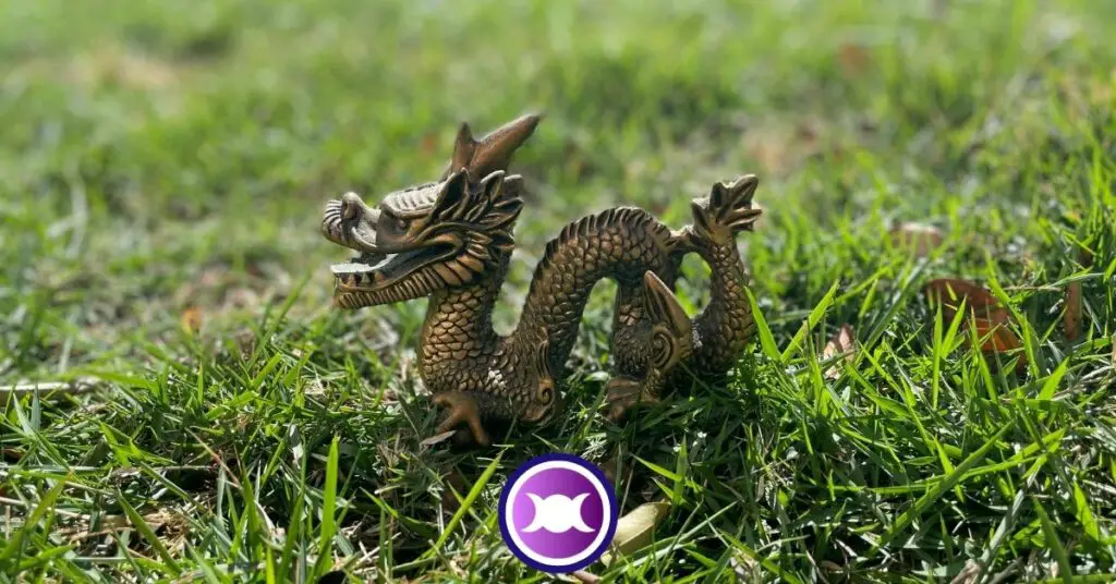 A Dragon statue on the grass